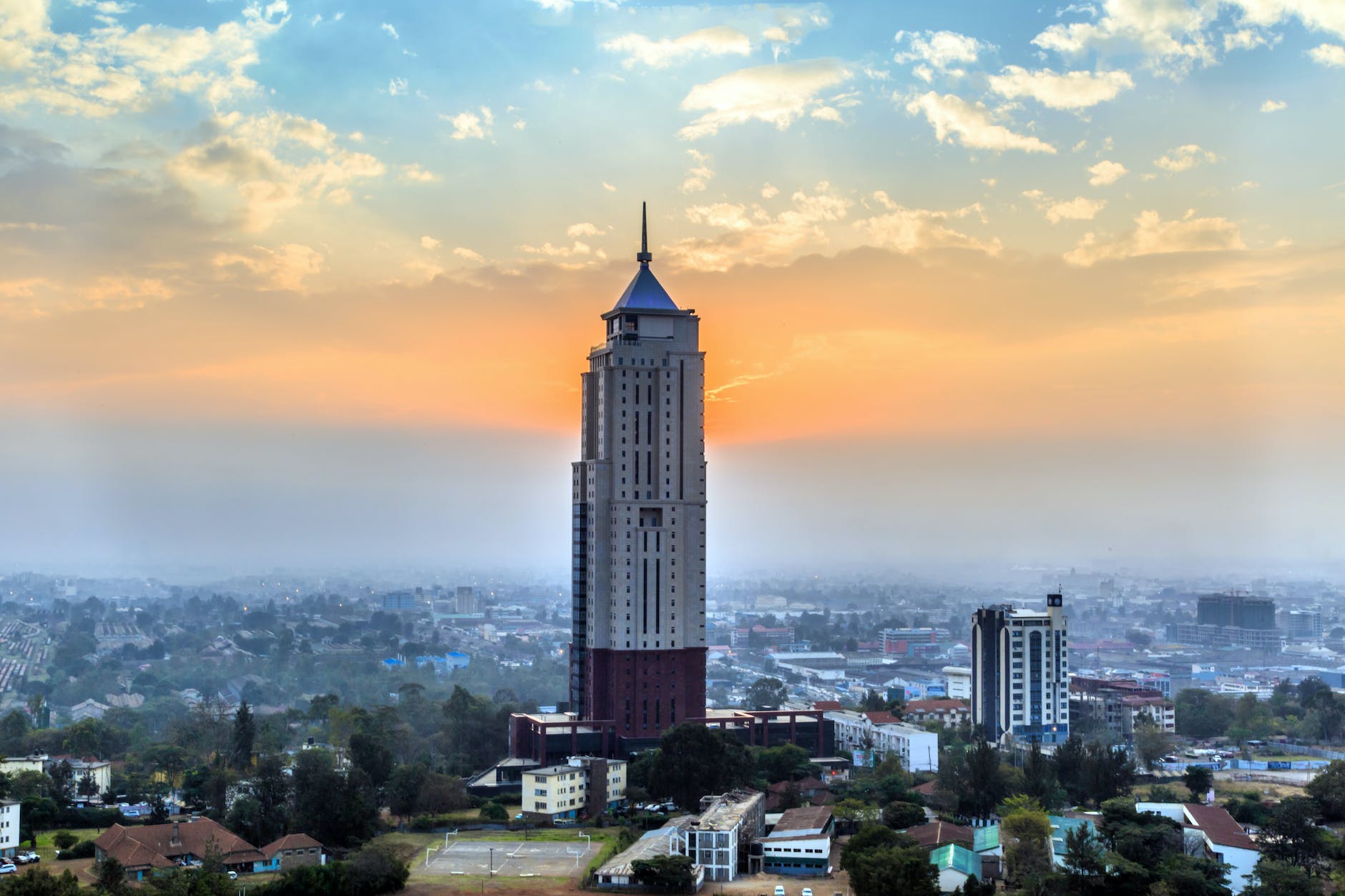 skyscraper towering above city skyline in nairobi kenya