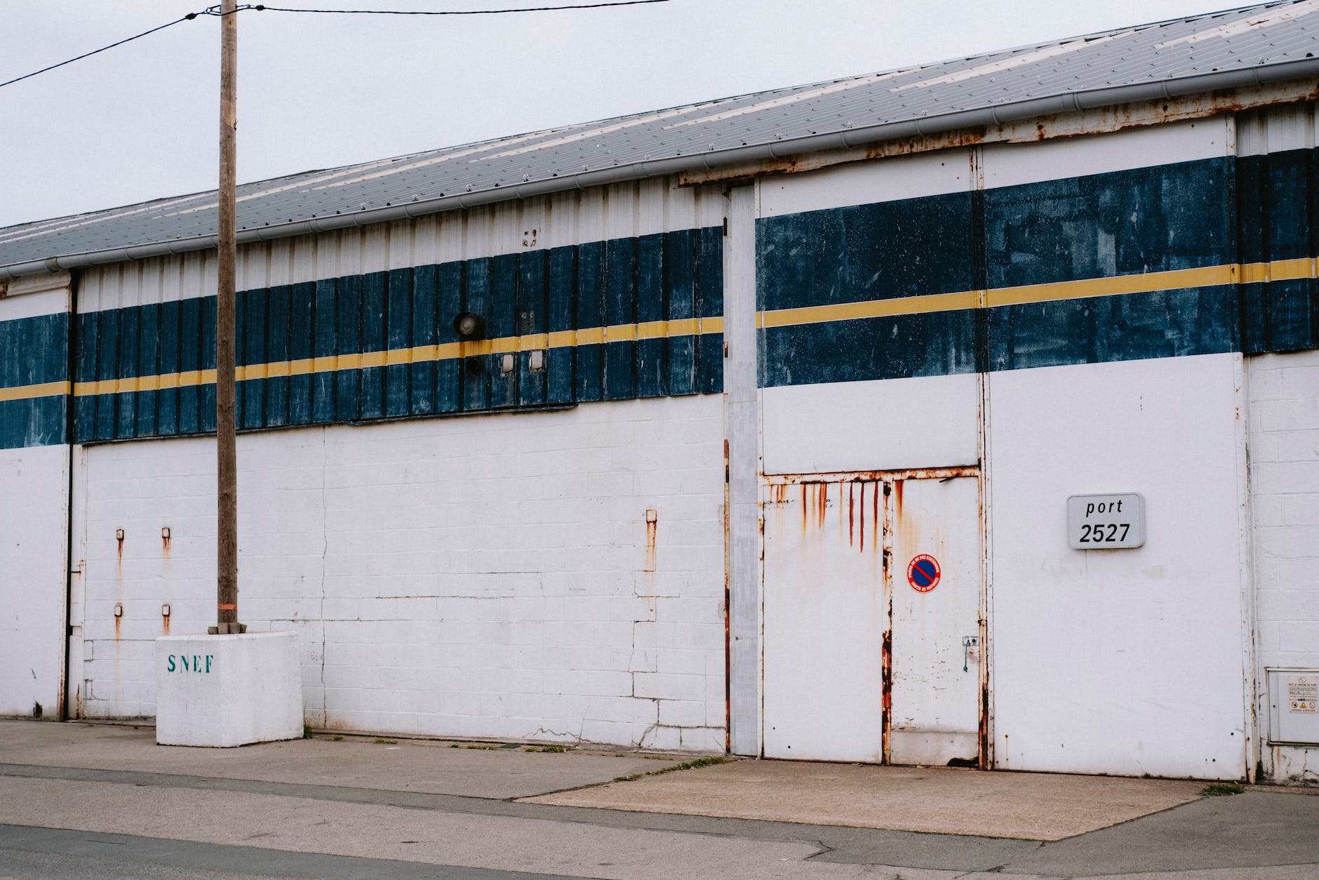 photo of a facade of a port warehouse